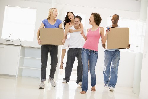 Professional Barnes movers packing household items carefully