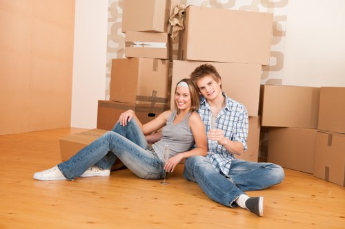 Packed boxes and furniture ready for removal truck hire in Barnes
