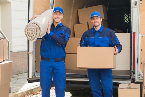 Barnes Movers team sorting recyclable packing materials during a sustainable move