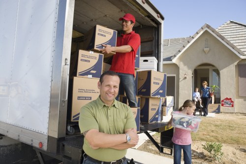 Local Barnes movers packing fragile household items with specialist materials