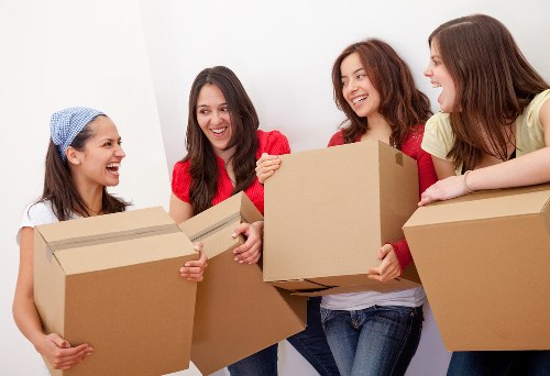 Moving van and packed boxes ready for transport