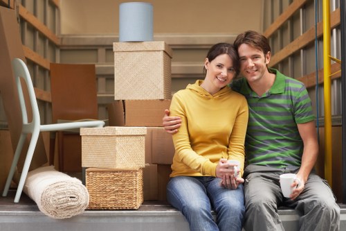 Careful piano transport through a Barnes residential property