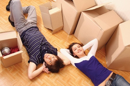 Barnes Movers staff separating items for recycling and reuse