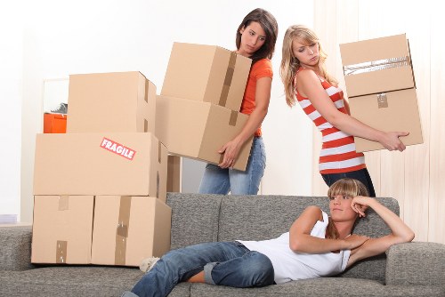 Professional movers loading furniture for same day removals in Barnes