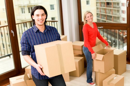 Professional movers loading items into a truck