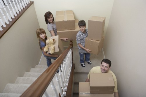 Professional movers loading furniture securely as part of a Barnes Movers relocation
